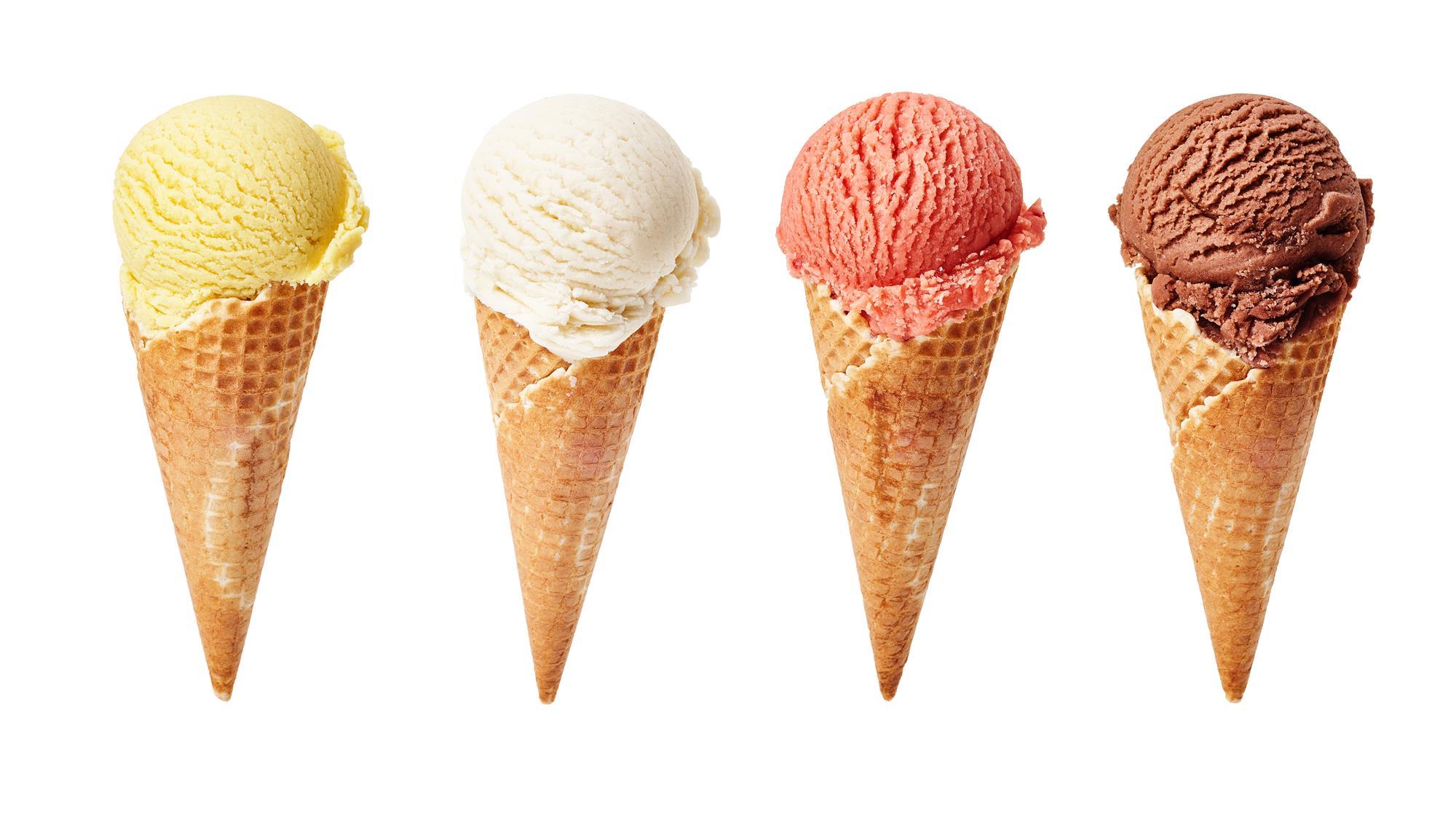 Four different colored ice cream cones lined up in a row