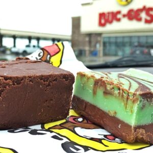 A picture of chocolate and mint chocolate fudge in front of the Buc-ee's building.