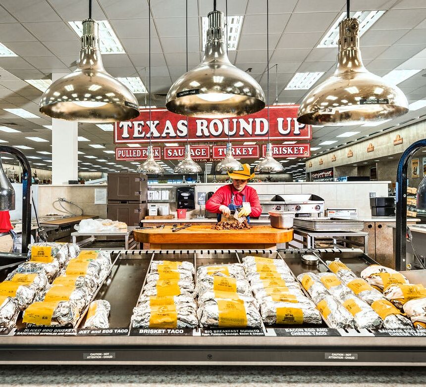 A picture of the meat and sandwich island in the center of Buc-ee's.